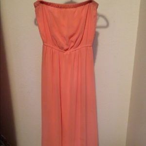Peach colored strapless maxi dress